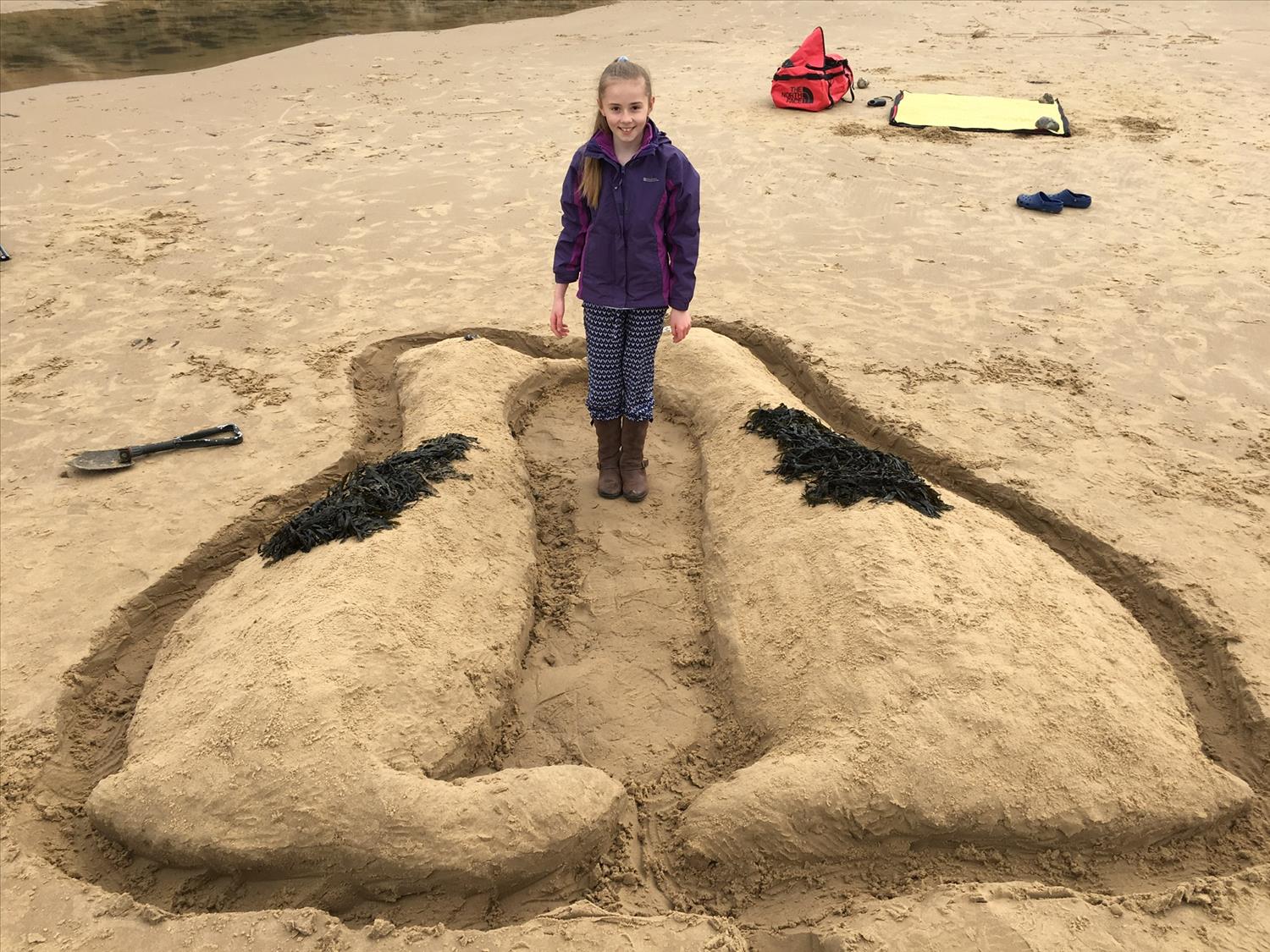 Penguin Sand sculpture on East Runton beach @NorfolkCoastline