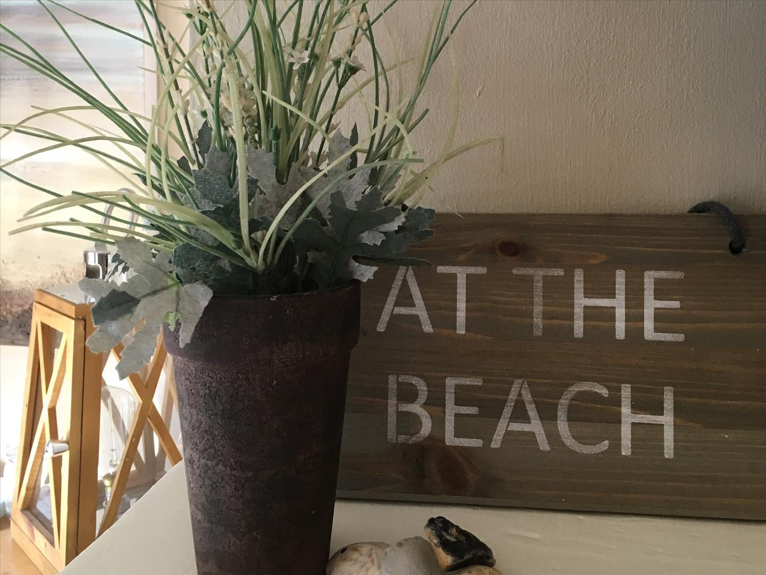 At the beach sign in living room 9 Melinda Cottage East Runton @NorfolkCoastline