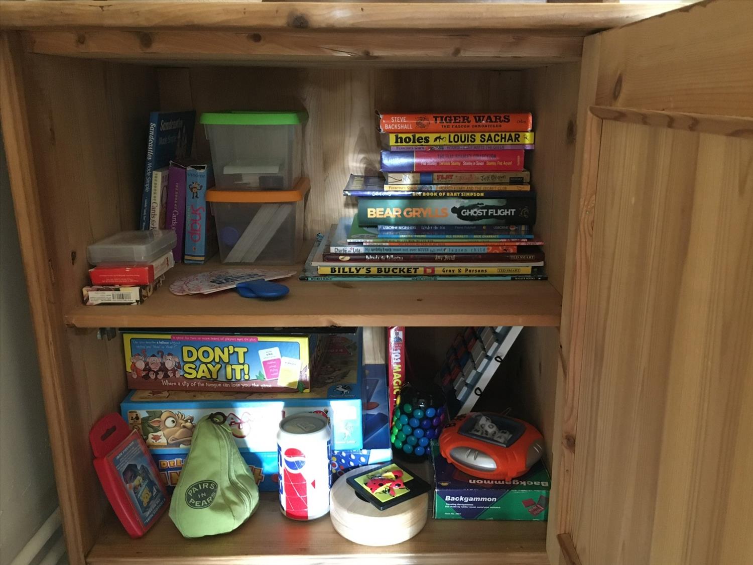 Games cupboard in living room 9 Melinda Cottage East Runton @NorfolkCoastline